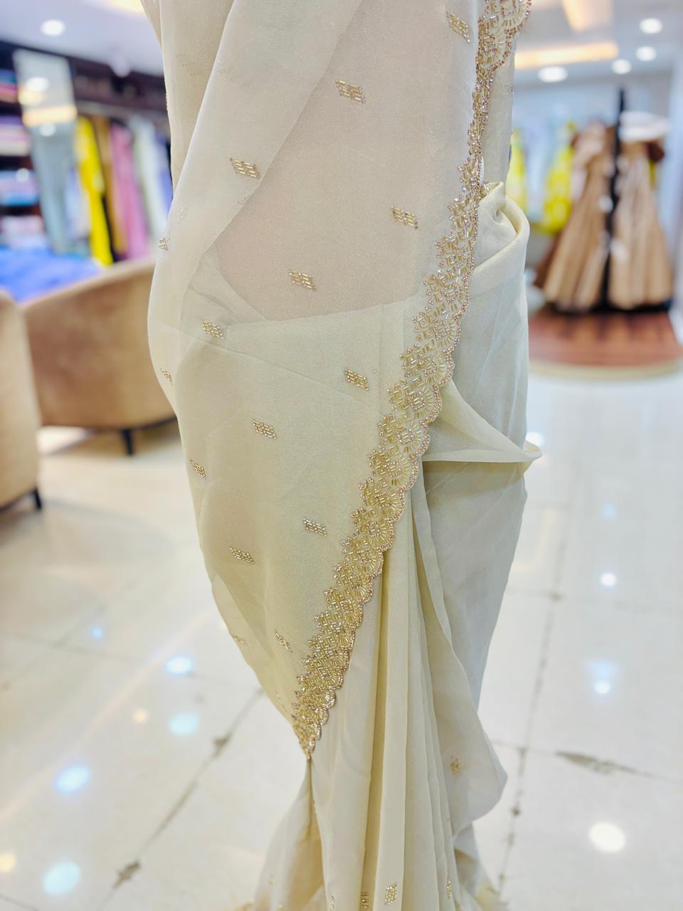 Ivory Tissue Organza Cutdana Detailing Saree